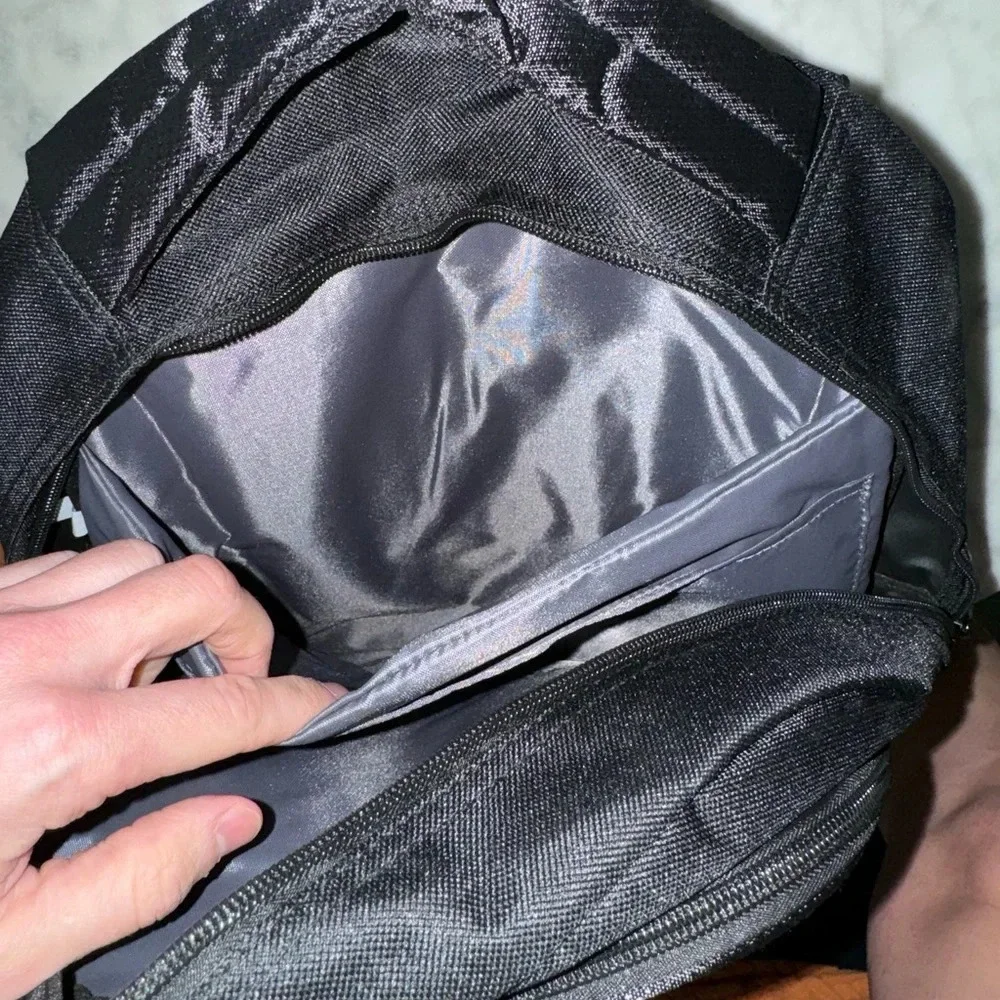 Black Backpack with 3 compartments for stuff NWOT 12x17x4